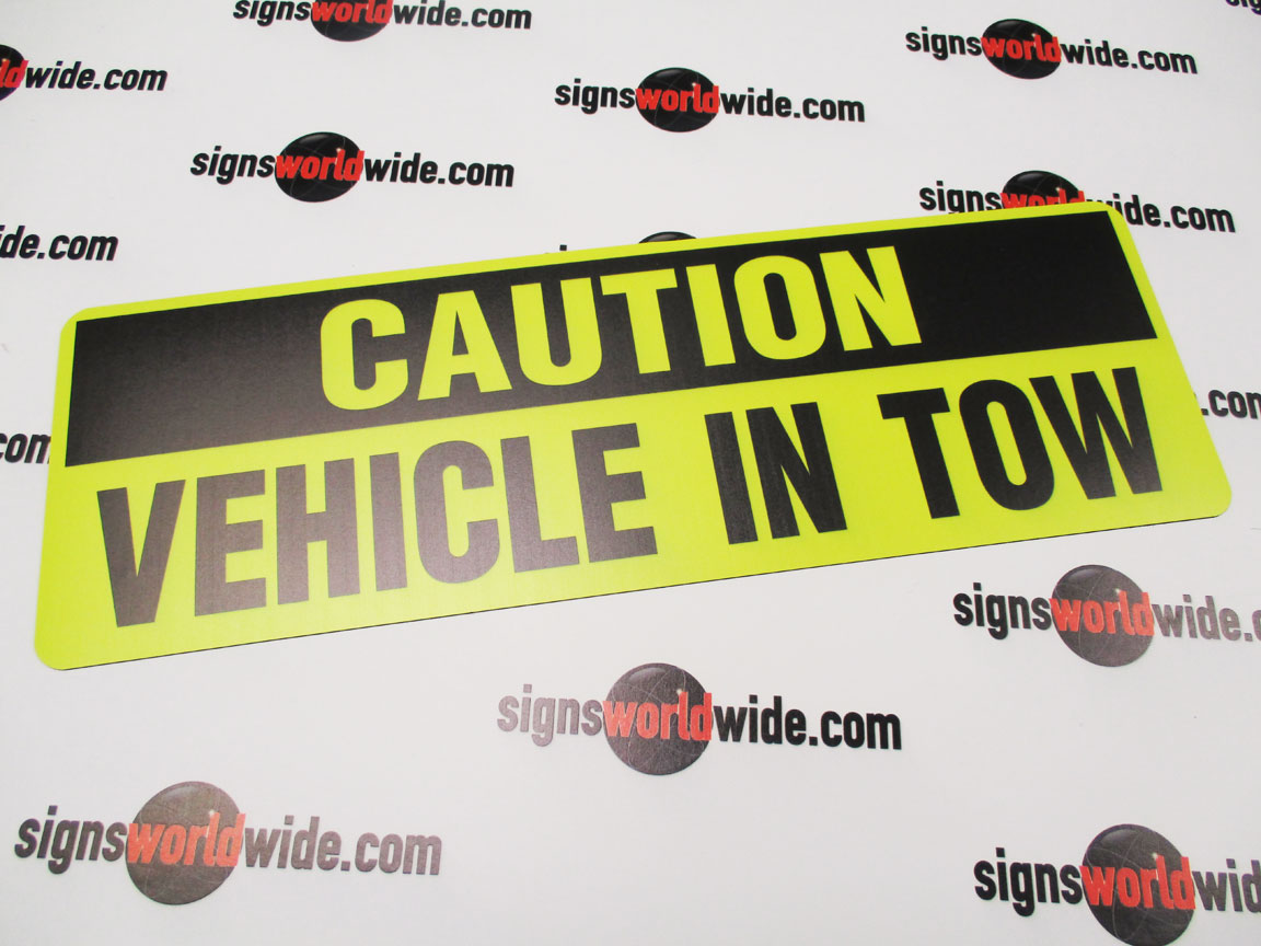 thumbnail image 2 of 'ON TOW' Reflective Magnetic Warning Sign - Black On Yellow, Small (300mm X 100mm) By Apple Signs 2 of 5