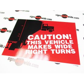 Caution This Vehicle Makes Wide Right Turns Sign Image