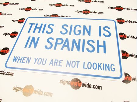 This Sign Is In Spanish Sign Image 1